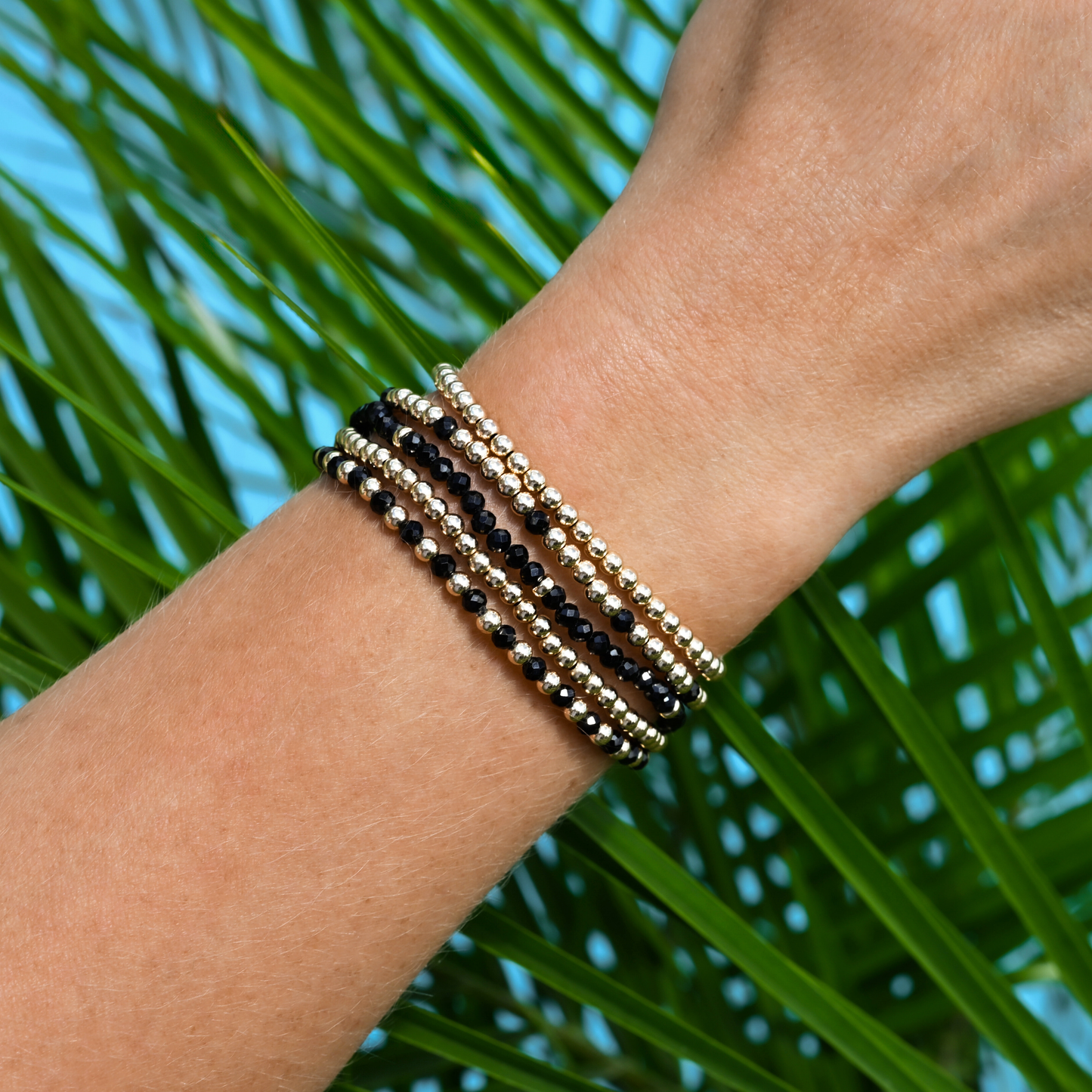 Gold Club active-luxe bracelet in black onyx with gold-filled elements