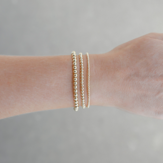 Durable gold jewelry stack by Shannon Hudson