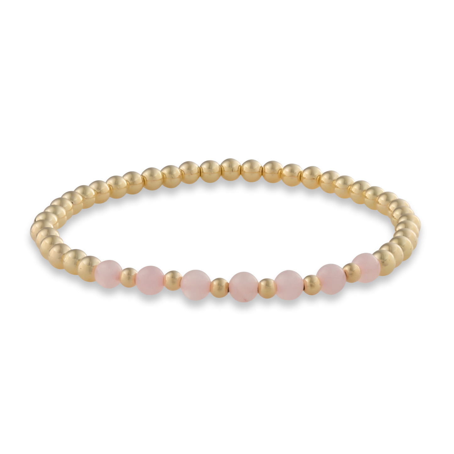 Minimal arc-style bracelet with smooth pink quartz beads framed in polished gold. Elegant, calming, and made for everyday wear.