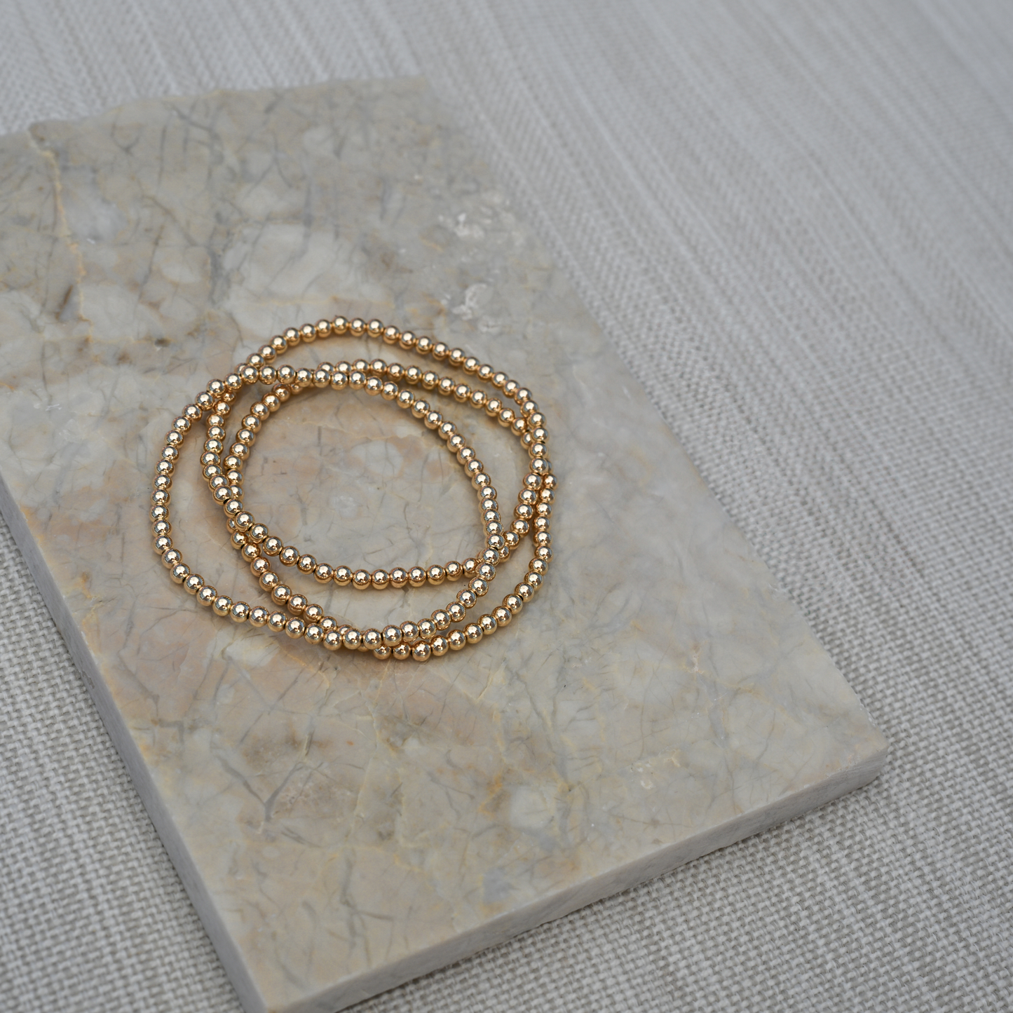 active lifestyle jewelry on marble