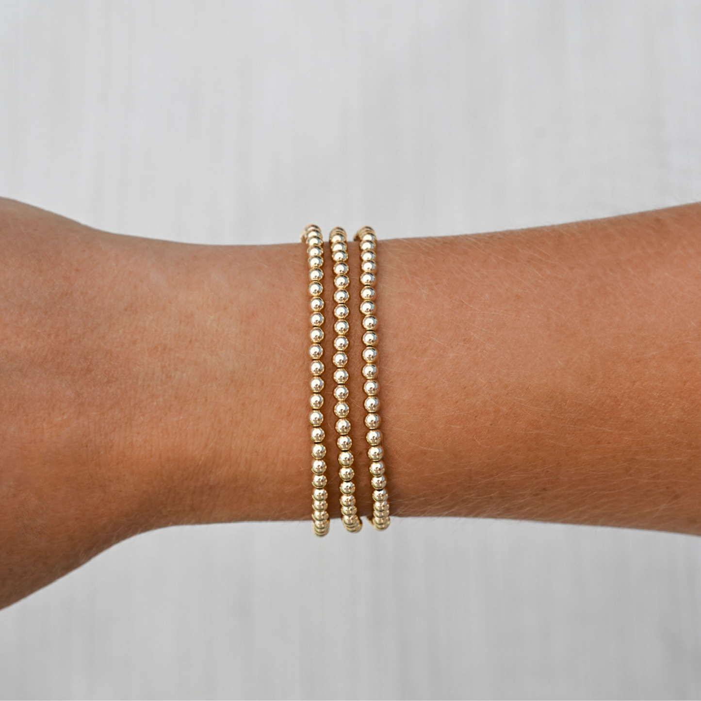 Gold club by Shannon hudson stack of three LustraFlex™ bracelets