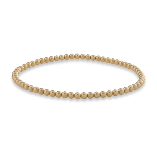 3mm gold beaded bracelet on a transparent background. 3mm Gold LustraFlex™ Bracelet from Gold Club by Shannon Hudson