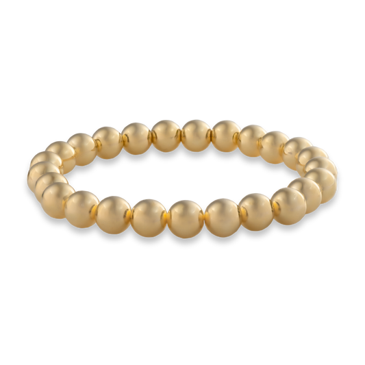 8mm gold beaded bracelet on a transparent background. 3mm Gold LustraFlex™ Bracelet from Gold Club by Shannon Hudson