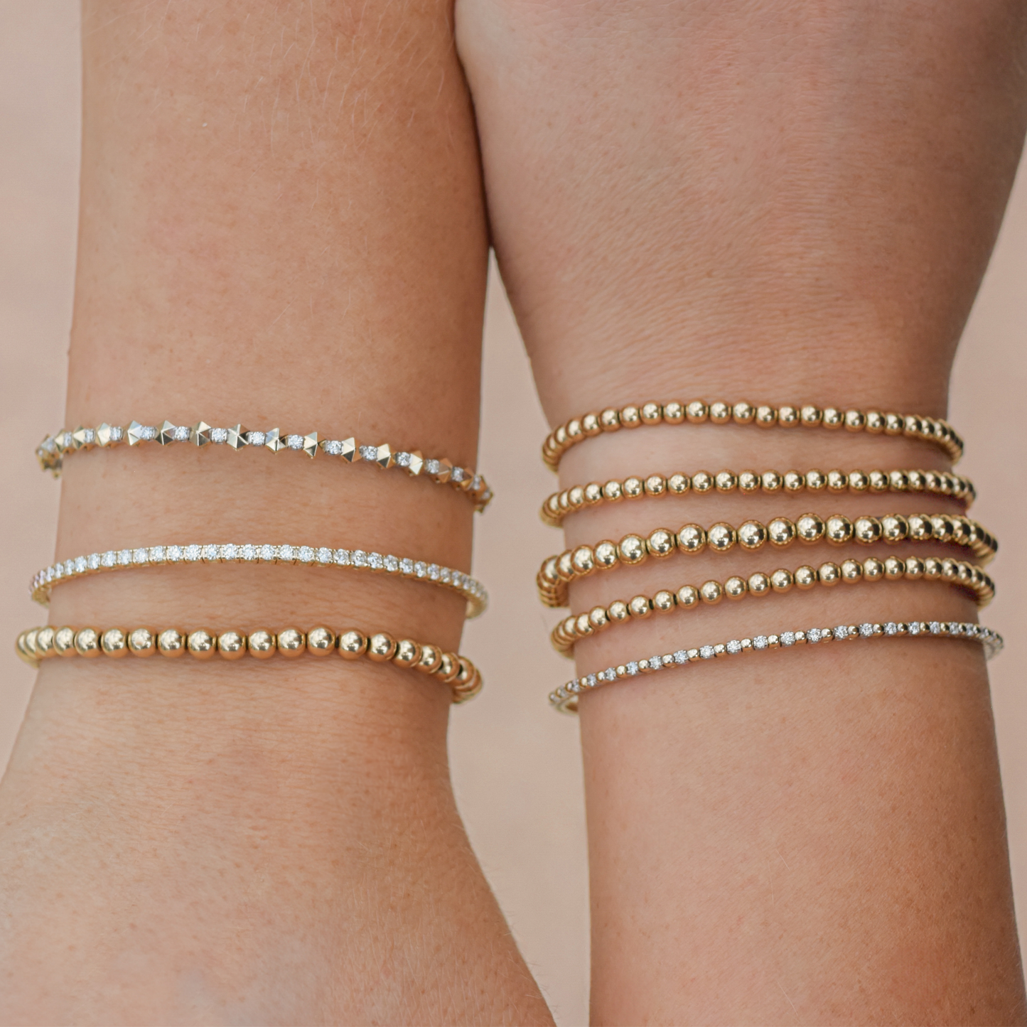 Styled wrist stack combining Gold Club 14k gold flex bangles with LustraFlex™ bead bracelets, modern layered jewelry look