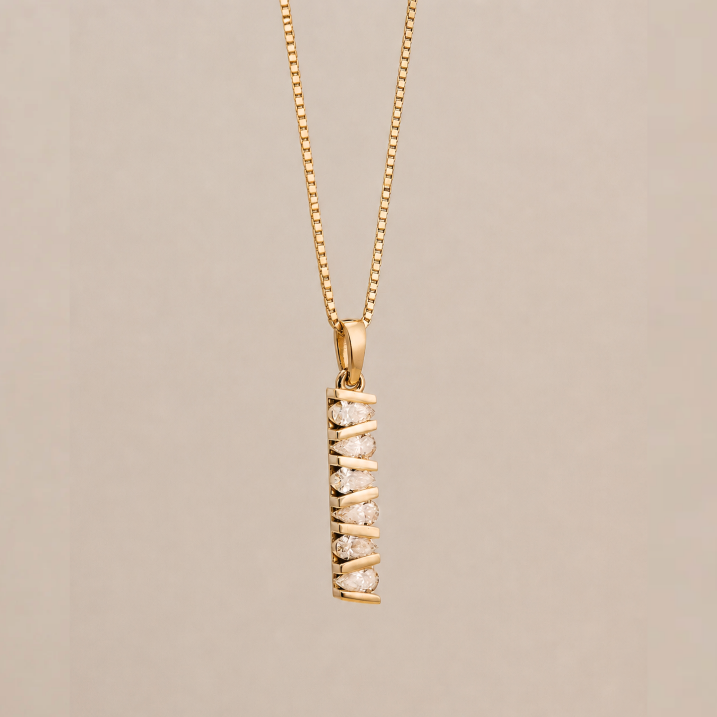 Architectural_Bar_Pendant on a 14k solid gold box chain. pear shaped diamonds totaling 1 carat