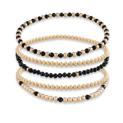 Detailed image of handcrafted natural black onyx gemstone and 14k gold filled bracelet with LustraFlex™ band from Gold Club by Shannon Hudson