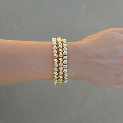 Three Large Gold LustraFlex™ bracelets by Shannon Hudson