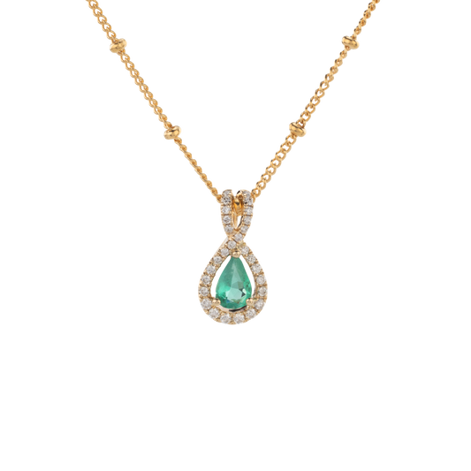 Emerald teardrop gemstone framed with sparkling lab-grown diamonds, crafted in 14k gold by Gold Club