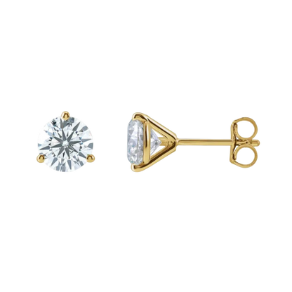 A pair of yellow gold stud earrings, one shown from the front with a round brilliant-cut clear gemstone and the other from the side showing the triangular prong setting and post with butterfly back.