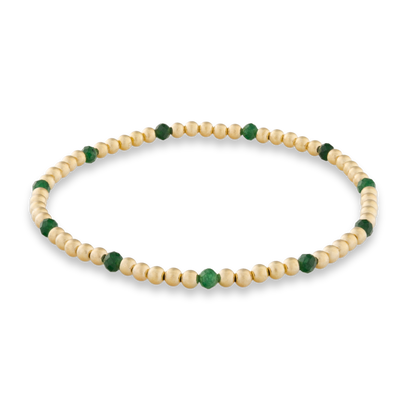 Beaded bracelet with natural green sandstone and gold beads on a transparent background