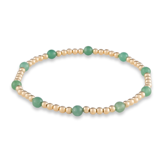Stylized bracelet with a repeating pattern of green agate and gold, designed for creativity and calm by GOLD CLUB.