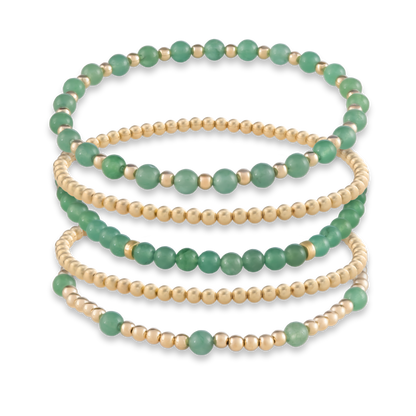 Rendered image of the full Green Agate Signature Stack with five coordinated bracelets in green agate and gold-filled beads.