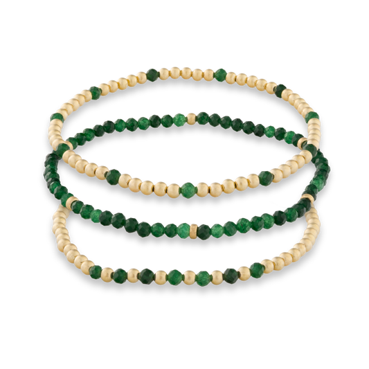 Green Sandstone and gold bracelet stack from gold Club Jewelry House that is sweat proof and tarnish resistant.