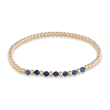 Gold Club by Shannon Hudson bracelet with arc of natural kyanite and gold-filled beads with their signature LustraFlex™ stretch cord.