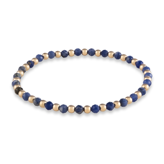 Balanced gemstone bracelet by Shannon Hudson featuring natural kyanite
LustraFlex™ stacking bracelet with blue kyanite and 14k gold-filled beads