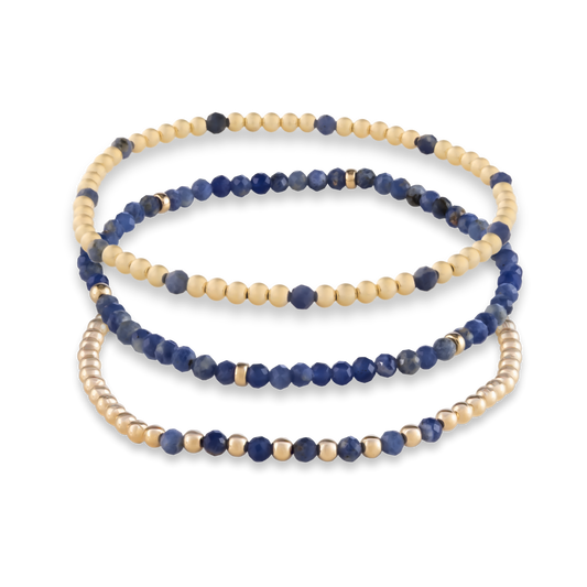 Gold Club by Shannon Hudson Kyanite Mini Stack bracelet set with Muse, Sun, and Arc designs in blue kyanite and 14k gold-filled beads, transparent background