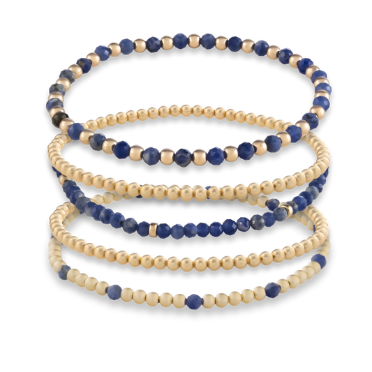 Gold Club Signature bracelet in kyanite gemstones, stacked with 14k gold-filled accents for a modern layered look