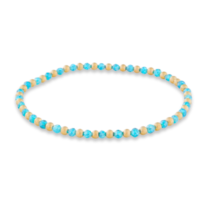 Beaded necklace with blue and beige beads on a white background