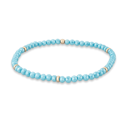 Light Blue (Aqua) Zircon & Sun