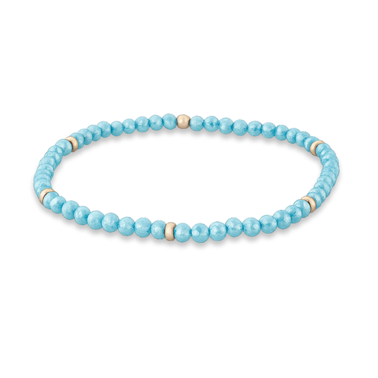 Light Blue (Aqua) Zircon & Sun