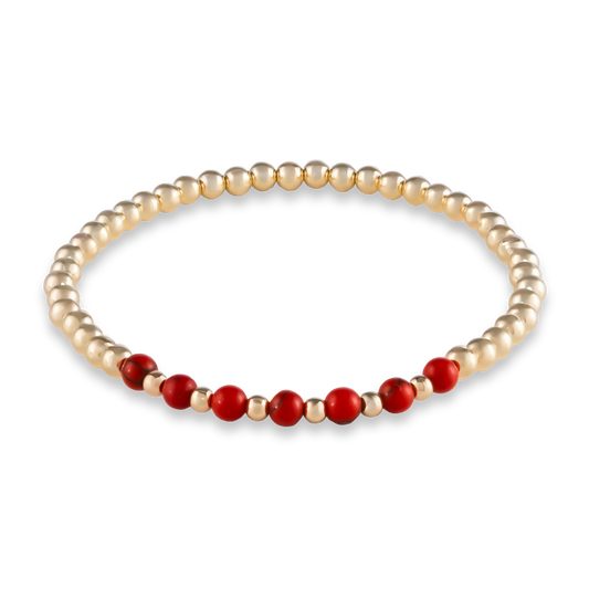 Minimalist gold-filled bracelet with red agate gemstones in a curved design from GOLD CLUB by Shannon Hudson.