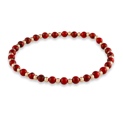 Balanced bracelet from the Red Agate Collection with alternating gold-filled and red agate beads, designed for movement and elegance.