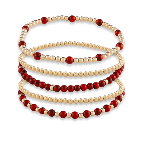 GOLD CLUB Signature Stack in Red Agate with five layered gold-filled bracelets, including gemstone styles and two classic gold accents.