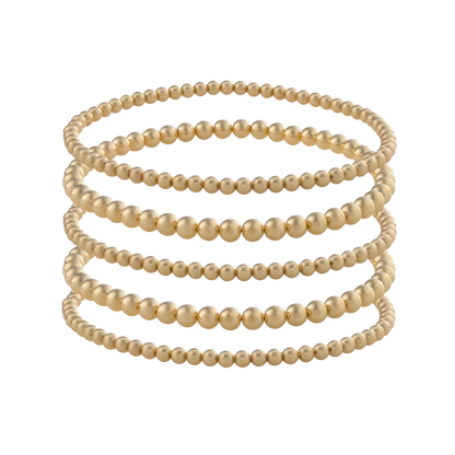 Set of five Gold Club by Shannon Hudson Gold LustraFlex™ Bracelets on a transparent background