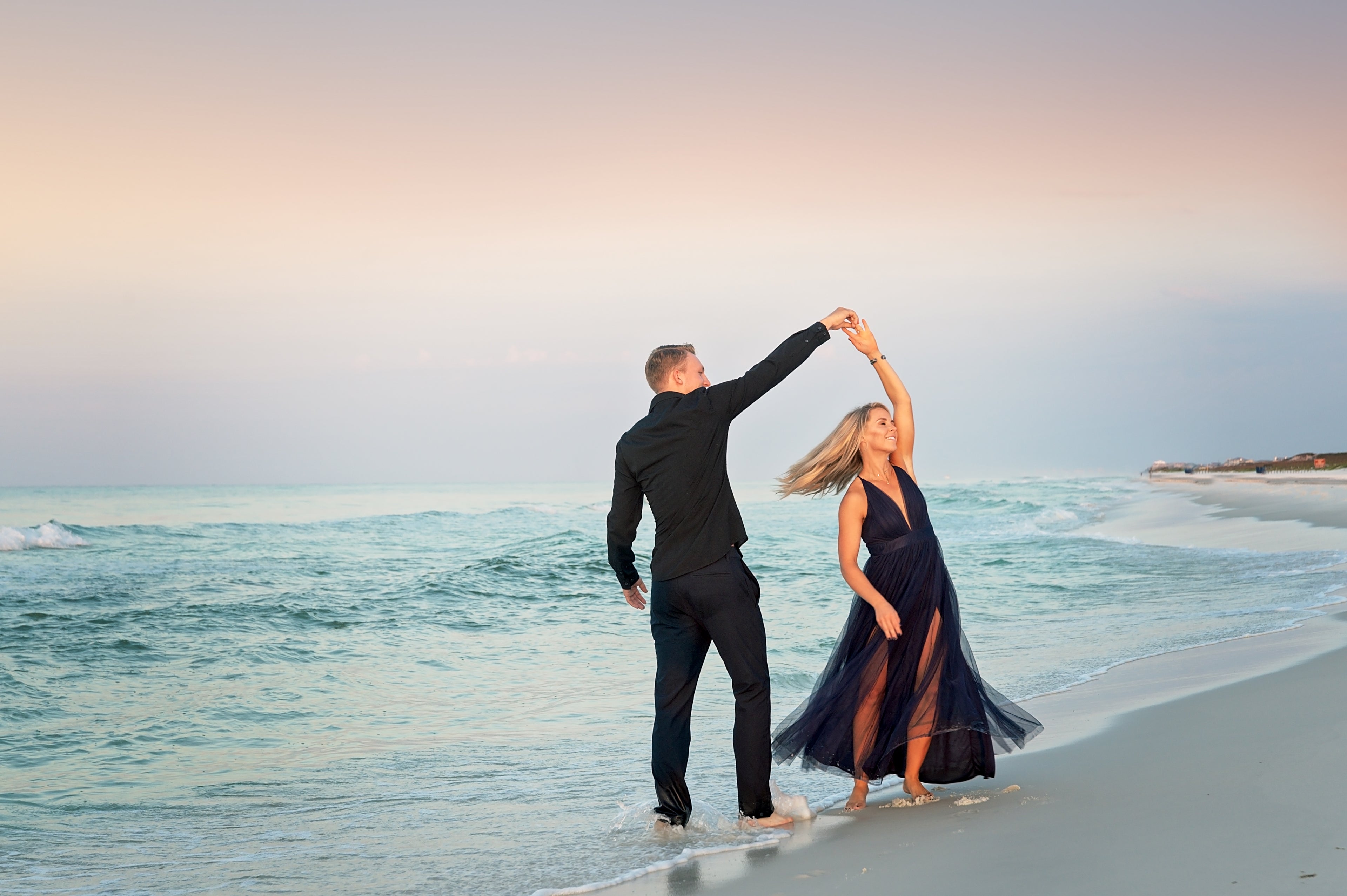 Shannon Hudson and Johan den Toom dancing on the beach in Gold Club by Shannon Hudson