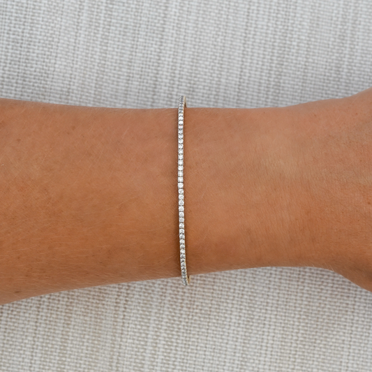 Signature Flex Bangle from Gold Club by Shannon Hudson with a lab-grown diamond set in gold-filled design