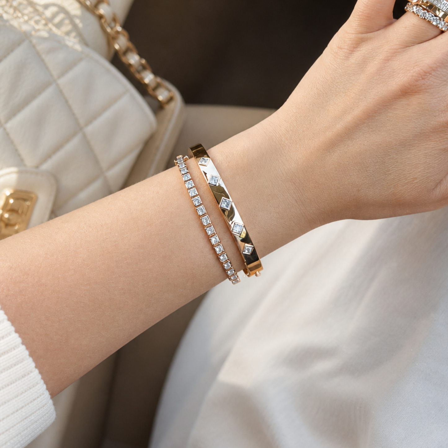Gold Bangles on a women's wrist