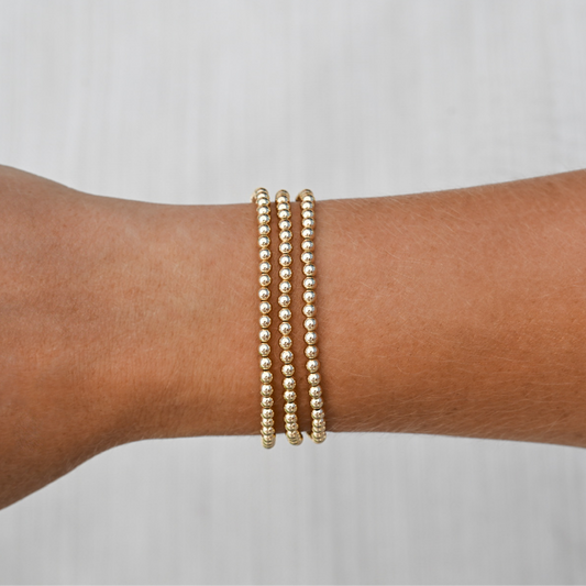 Gold club by Shannon hudson stack of three LustraFlex™ bracelets