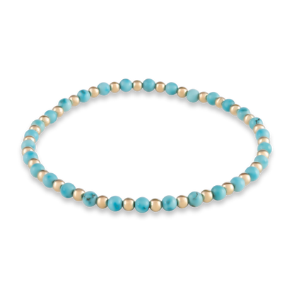 Alternating turquoise and gold-filled beads in a centered, symmetrical bracelet design—crafted for bold balance and wearable intention.