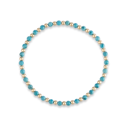 Alternate rendering angle of a turquoise bracelet from GOLD CLUB, showcasing bead details and signature movement-friendly design.