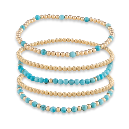 Digital rendering of the Turquoise Signature Stack, featuring five bold yet balanced bracelets in turquoise and gold-filled beads.